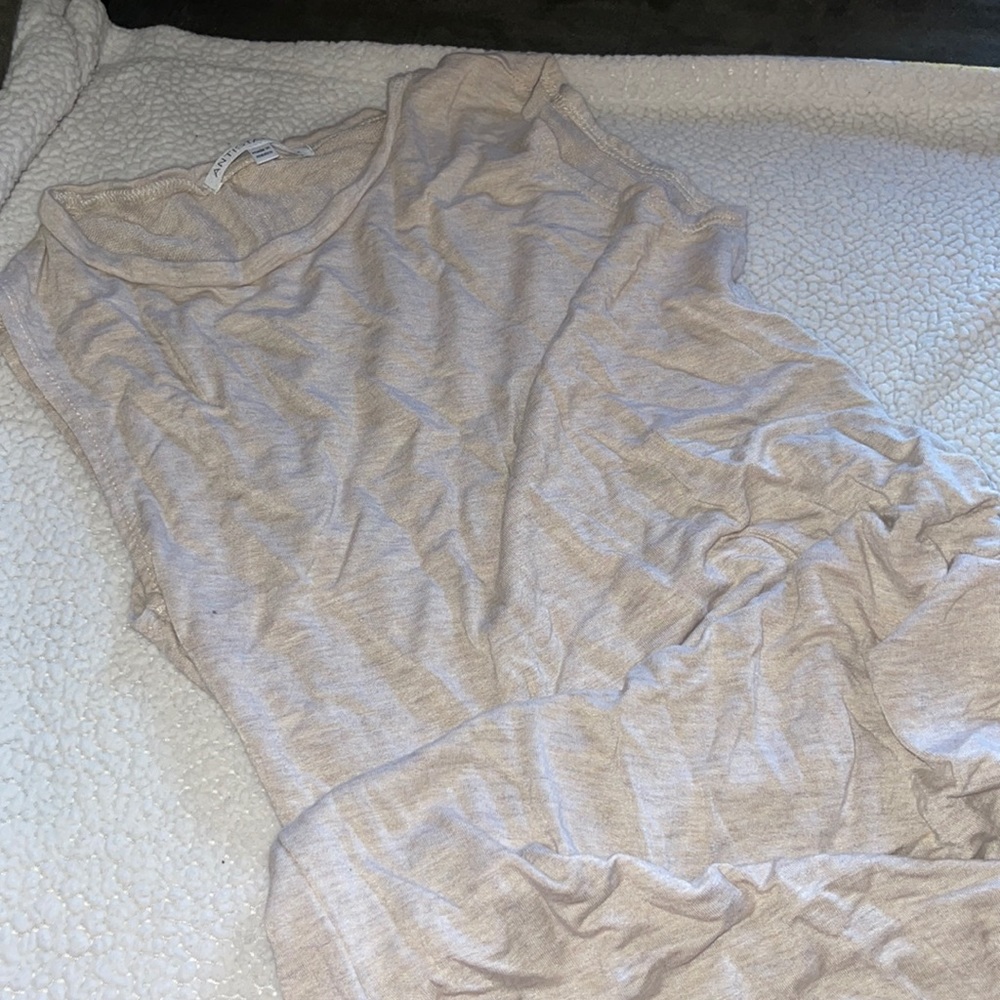 Medium tan beige/ cream dress. Scrunches at the bottom of left leg.